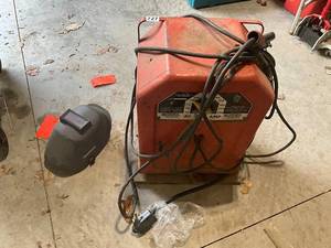 lot 728 image: Lincoln 225 Amp AC Welder with Helmet