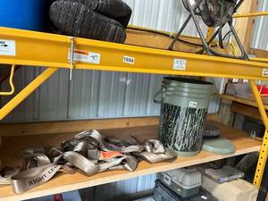 lot 732 image: Hunting Gear Set with Camo Chair, Bucket, and Tree Belts