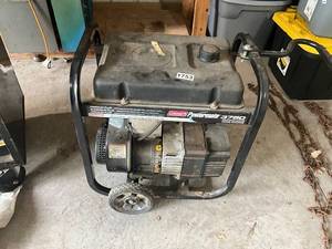 lot 755 image: Coleman Powermate 3750 Portable Generator
