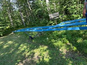 lot 3 image: Heavy-Duty Blue Steel Boat Trailer Frame with Winch and Seat