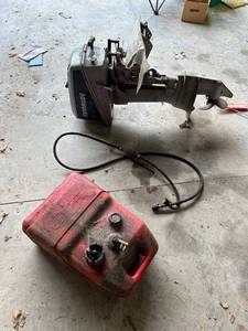 lot 5 image: Evinrude 6 HP Outboard Motor with Fuel Tank and Hose