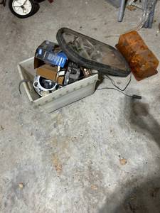 lot 771 image: Automotive Parts Lot with Sylvania Halogen Headlight and Wheel Spacers