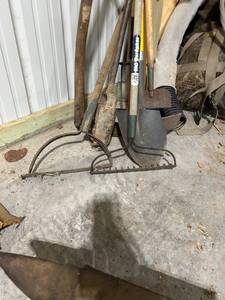 lot 774 image: Collection of Assorted Garden Tools Including Rakes, Shovels, and Hoe