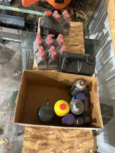 lot 789 image: Collection of Outboard Lubricants and Hydraulic Fluids Including Evinrude, Mercury, and More