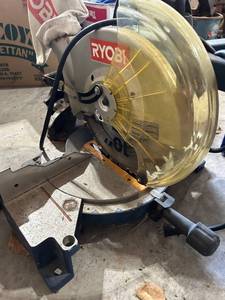 lot 799 image: Ryobi 10 Inch Compound Miter Saw