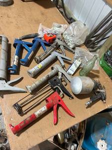 lot 890 image: Collection of Caulk Guns, Tape Measure, Spray Gun, and Hardware Fasteners