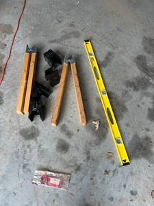 lot 891 image: Sawhorse Brackets with Wood Legs and 24-Inch Stanley Level