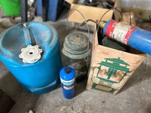 lot 911 image: Vintage Coleman Lantern with Propane Tanks and Blue Water Jug