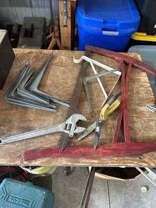 lot 915 image: Assorted Hand Tools and Hardware Including Wrench, Saw, Brackets, and Shears