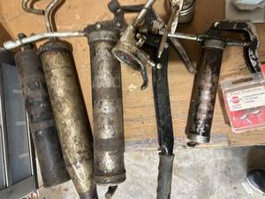 lot 918 image: Assorted Grease Guns with Mixed Hardware and Fasteners