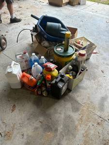 lot 871 image: Garage Chemicals, Oils, Funnels, and Garage Tools Lot