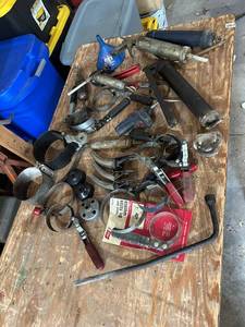 lot 873 image: Automotive Oil Filter Wrenches, Grease Guns, and Tool Lot