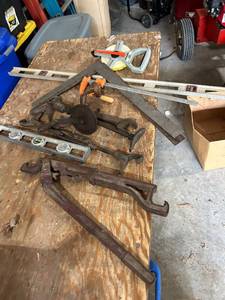 lot 878 image: Assorted Vintage Hand Tools Including Levels, Wrenches, and Clamps