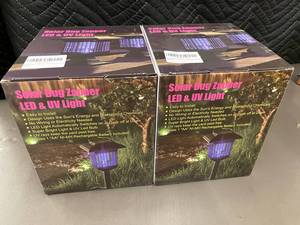 lot 31 image: Solar Bug Zapper LED & UV Light Outdoor Stake - 2 Pack