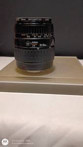 lot 20 image: Minolta AF 28-80mm Zoom Lens with 55mm Skylight Filter