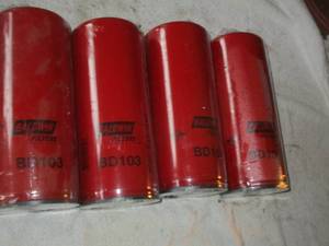 lot 43 image: Baldwin BD103 - Engine Oil Filter Dual Flow Lube Spin on Used for Cummins Engines - Set of 4