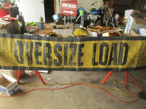 lot 57 image: Set of 4 Oversized Load Signs and Red Flags