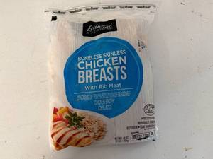 lot 106 image: EE. 3lbs Boneless Chicken Breasts-Possible 12 Cut Slit From Case Opening