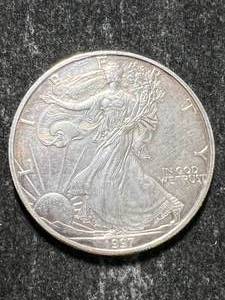 lot 46 image: 1997 AMERICAN SILVER EAGLE 1 TROY OZ .999 FINE SILVER