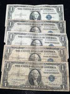 lot 67 image: 5 US BLUE SEAL $1 SILVER CERTIFICATES