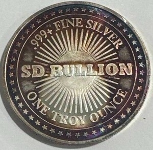 lot 15 image: Vintage 1oz .999 Silver Round (beautiful toning)