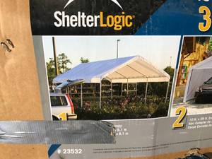 2 Shelter Logic Portable Canopies