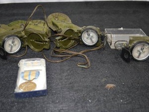 lot 17 image: VINTAGE MILITARY COMPASSES AND MEDAL.