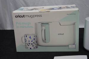 lot 59 image: CRICUT MUG HEAT PRESS