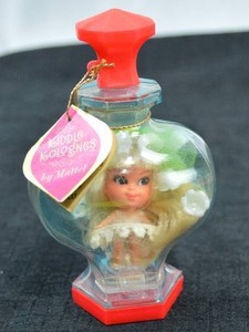 lot 92 image: RARE Mattel Liddle Kologne Lily of the Valley Kiddle with Tag