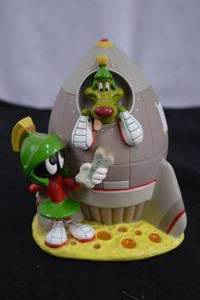 lot 187 image: Looney Tunes WB 1996 Rocket Spaceship Piggy Bank