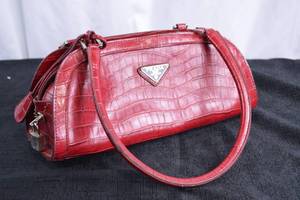 lot 217 image: Red Prada Bag