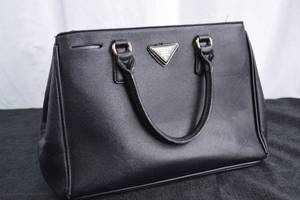 lot 218 image: Black Prada Bag