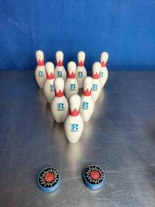 lot 44 image: Brunswick Max Gaming Bowling Pins and Hockey Pucks