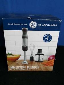lot 142 image: GE Immersion Blender with an Accessories Kit.