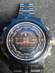 lot 13 image: Renato T-Rex Ana-Digi World Timer Watch