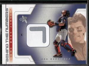 lot 96 image: Ivan Rodriguez Game-Worn Jersey Relic 2002 Fleer EX Behind The Numbers Baseball Card