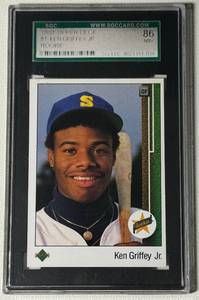 lot 15 image: Ken Griffey Jr RC SGC 86 NM 1989 Upper Deck #1 Iconic Rookie Baseball Card
