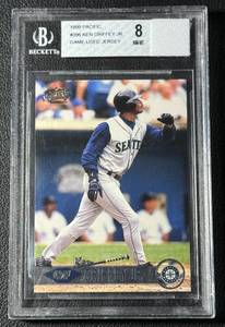 lot 252 image: Ken Griffey Jr. Game-Used Jersey Beckett Graded 8 NM-MT 1999 Pacific #396 Baseball Card