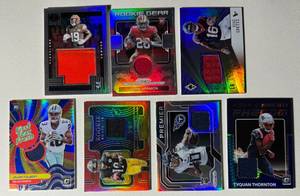 lot 253 image: 7 Card Lot Relic and Numbered  Rookie WR and RB Football Cards