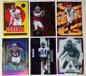 lot 261 image: 6 Defensive Star Numbered Card Lot - Sauce Gardner 199, Will Anderson, Jalen Carter, and More Football Cards