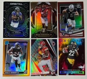 lot 266 image: 6 Running Back Star Numbered Card Lot - Jacobs 99, Pacheco 125, Herbert 199, Robinson 49, Dobbins  35, Harris 299 Football Cards