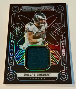 lot 282A image: Dallas Goedert 125 Relic 2022 Obsidian Atomic Material #AM-DGO Numbered 033125 Football Card