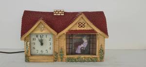 lot 204 image: Unique HADDON Electric Clock