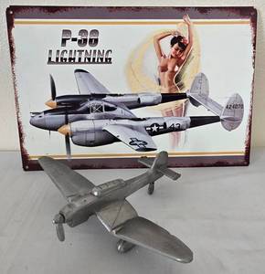 lot 220 image: Vintage P-38 Lightning Tin Sign & Airplane Replica