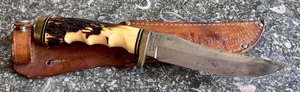 lot 56 image: Schrade USA 153UH Fixed Blade Knife with Stag Handle and Leather Sheath