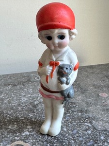 lot 72 image: Vintage Frozen Charlot Figurine with Dog 5.75 Inches Tall