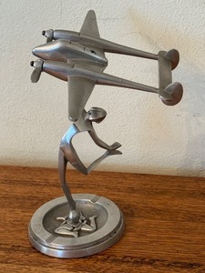 lot 80 image: Vintage Silus Aluminum Art Deco Airplane and Dancing Figure Sculpture