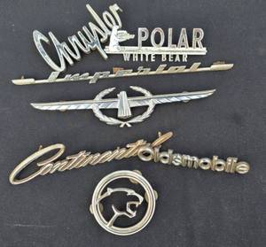 lot 296 image: Vehicle Grill Badge & Emblem Selection & More