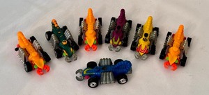 lot 140 image: Set of 7 Hot Wheels Eevil Weevil Diecast Cars Assorted Colors