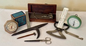lot 158 image: Assorted Vintage Room Thermometers, Scissors, Sharpening Stone, and Tools Collection